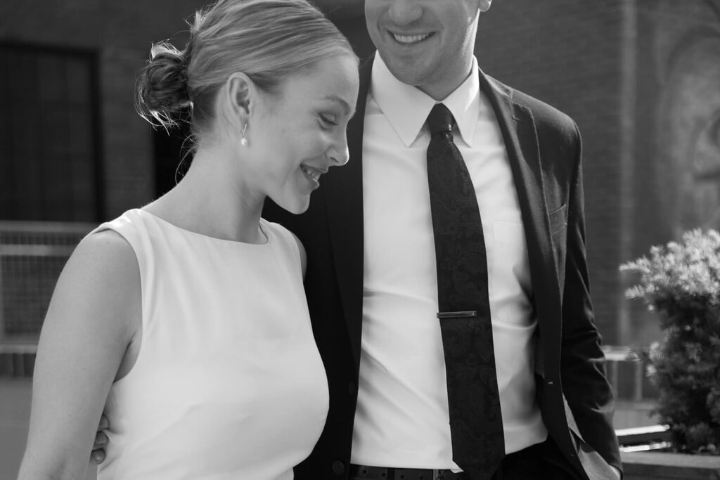 Bride and groom stroll together outside of Soho House in Nashville, Tennessee