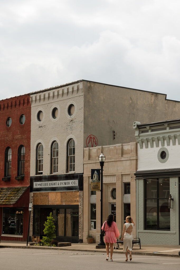 Bride and her best friend wander through the quaint Main Street of Springfield, Tennessee