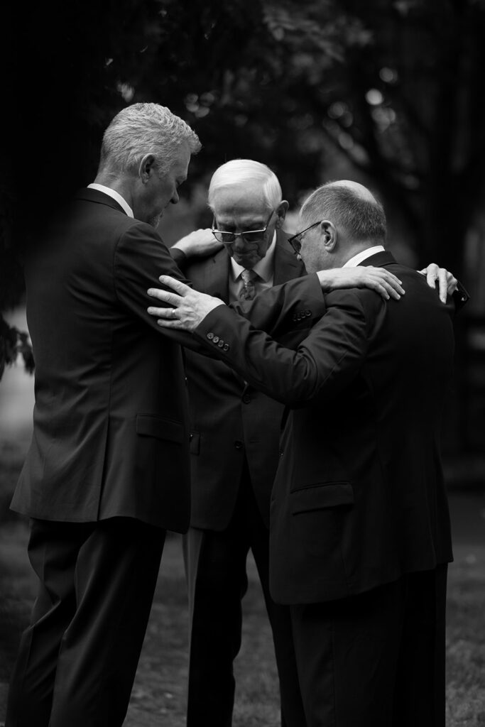 Preachers say a prayer before wedding ceremony in Brentwood, Tennessee