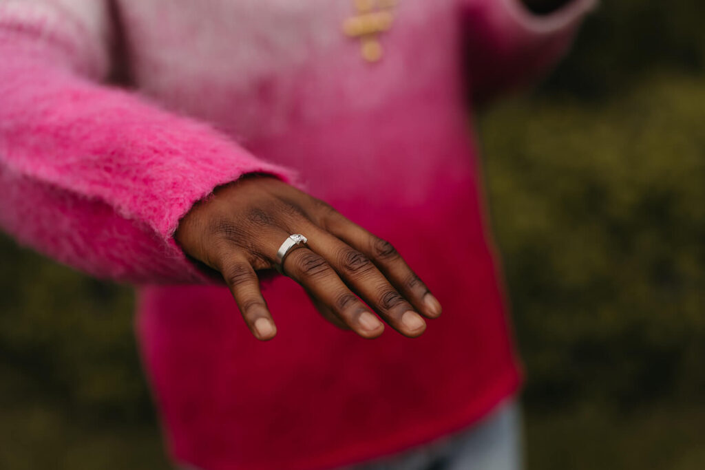 Man shows off his engagement ring in Nashville photoshoot