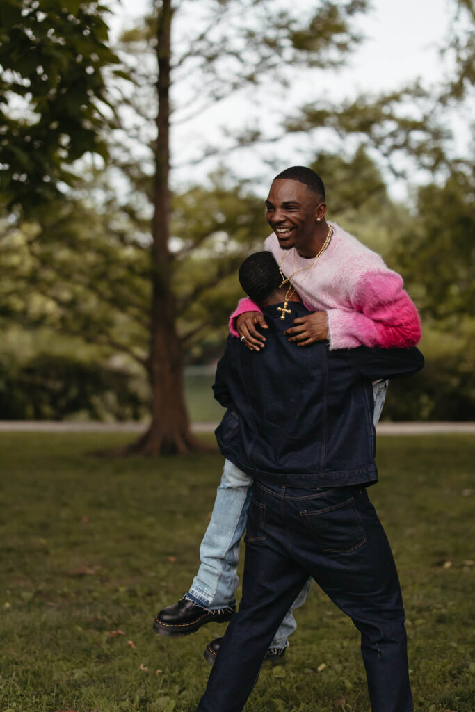 Newly engaged couple romps together in park in Nashville