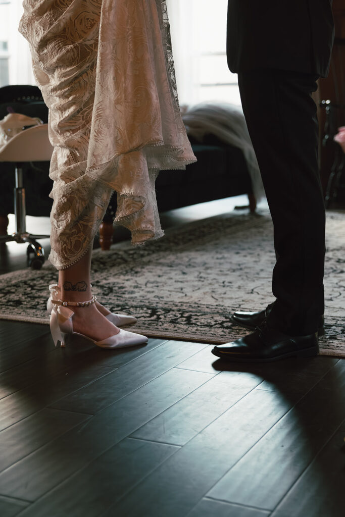 Bride and groom's feet are seen as they see each other for the first time