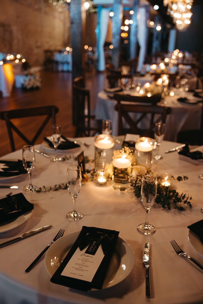 Warm, candlelit wedding reception space at Emerald Union in Tennessee