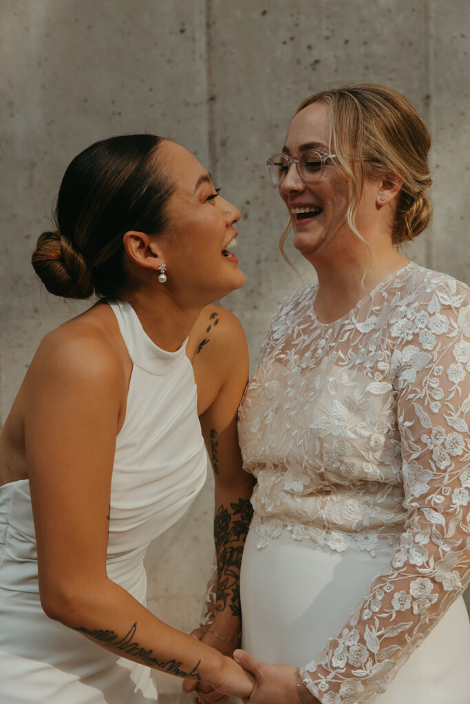 Minnesota couple smiles at each other at their wedding