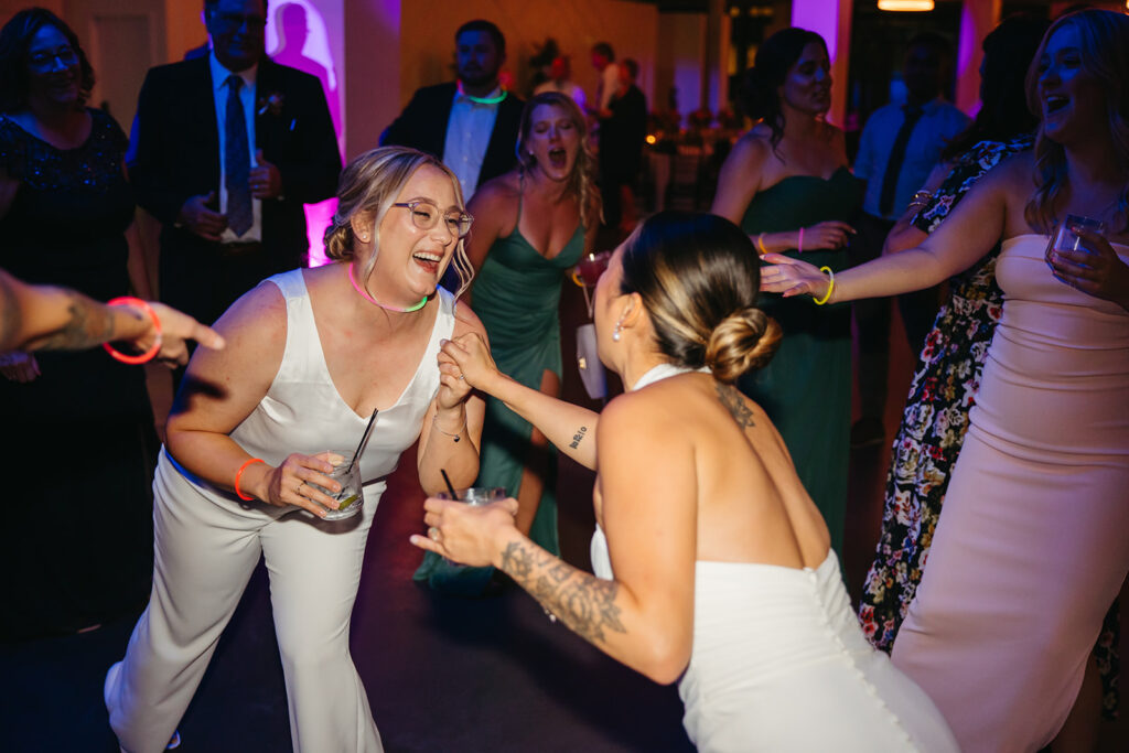 Brides dance with each other during Minnesota wedding