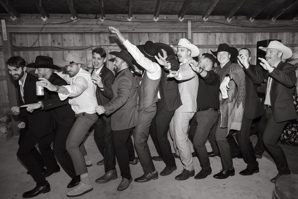 Wedding guests form a conga line at Yellowstone wedding reception