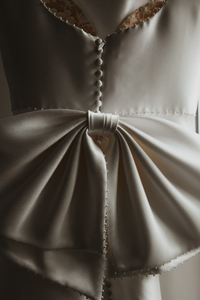 Close up of bride's enormous bow on her Belle Ame Bridal wedding gown