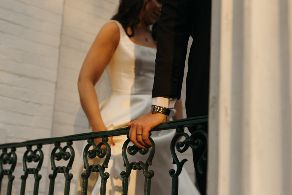 Groom grips gorgeous balcony of historic wedding venue in Nashville