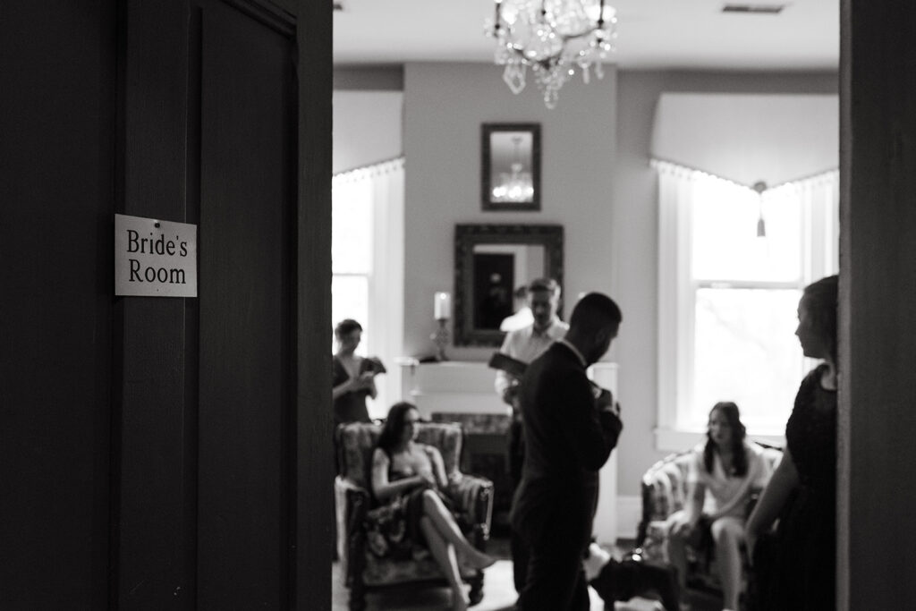 Bride and friends get ready in bridal suite at Riverwood Mansion in Nashville