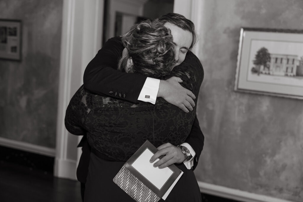 Groom hugs his mom during emotional getting ready