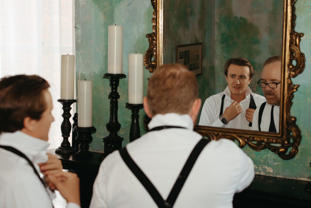 Groom and his father get ready together in East Nashville home