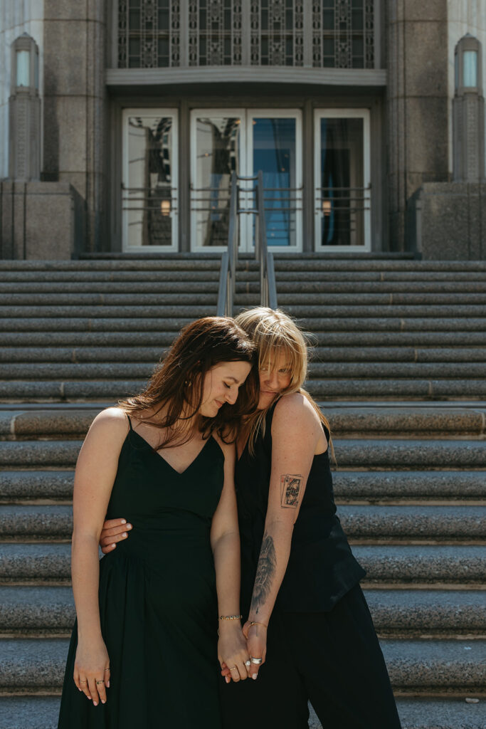 Newly engaged couple poses outside Frist Art Museum in downtown Nashville