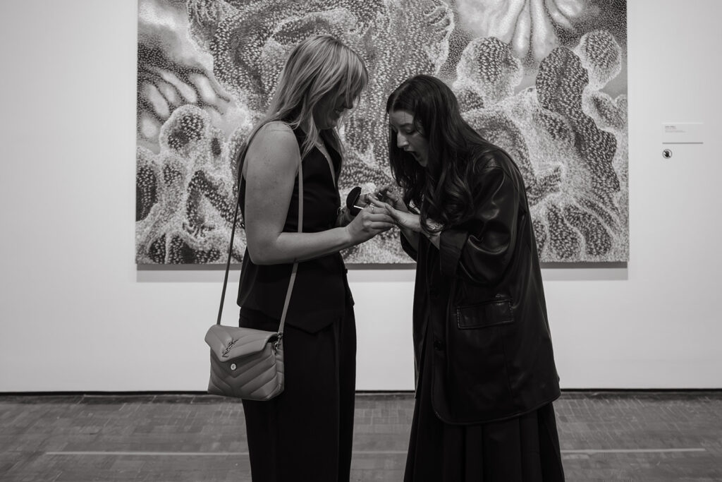 Shock is written all over woman's face as she admires her engagement ring