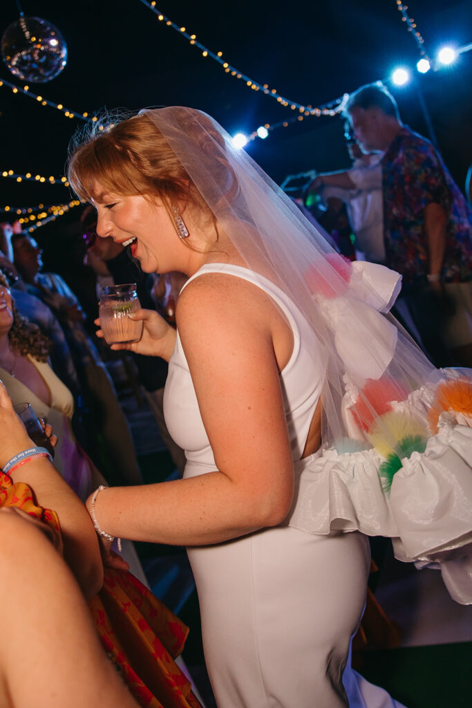 Bride dances at reception at destination wedding in Mexico