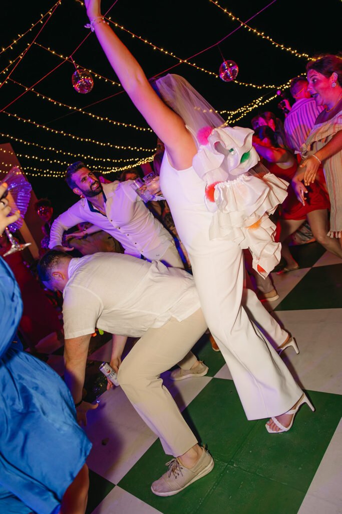 Bride and groom drop it low on the dance floor