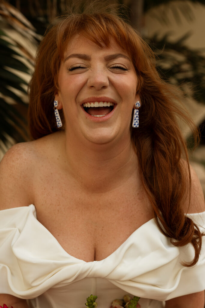 Bride's joyful expression at destination wedding in Mexico