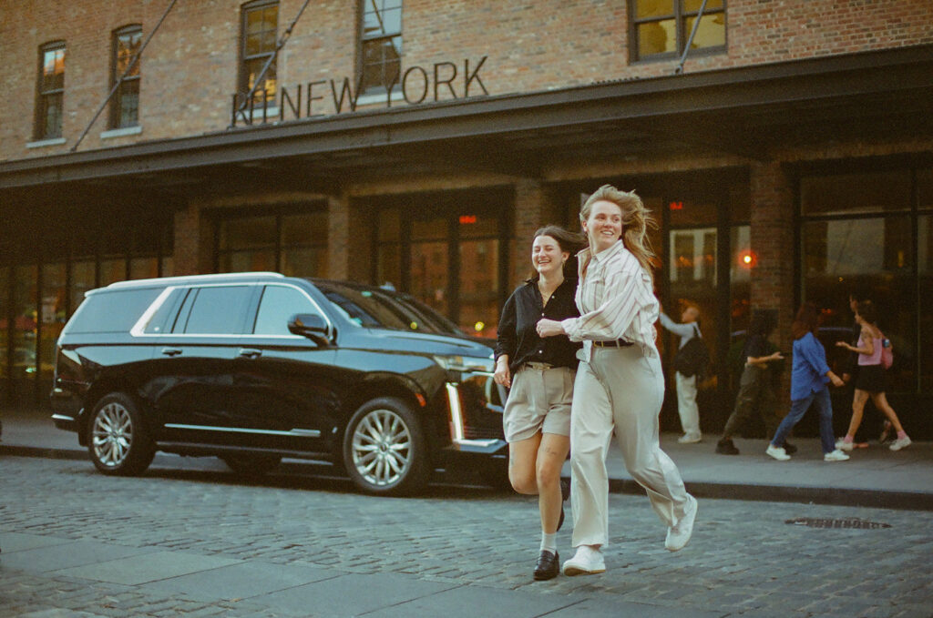Queer couple runs across the street during their New York City wedding proposal.