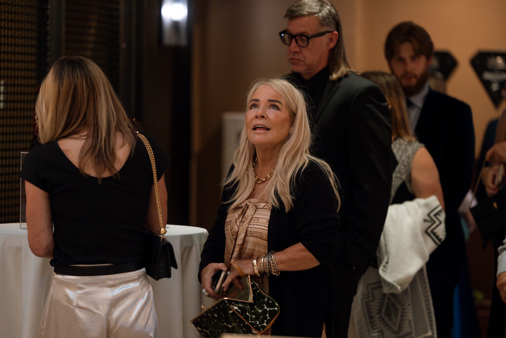 Wedding guest marvels at the ceiling of Union Station in Nashville. 