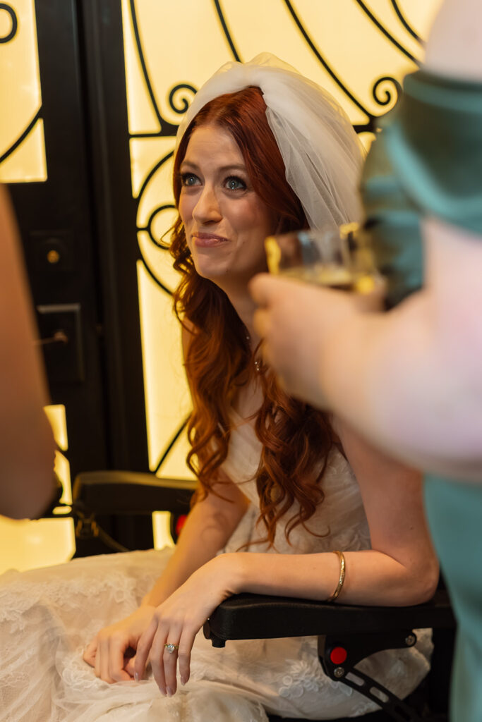 A tear threatens to spill over during emotional moment at Union Station wedding in Nashville, captured by a documentary wedding photographer