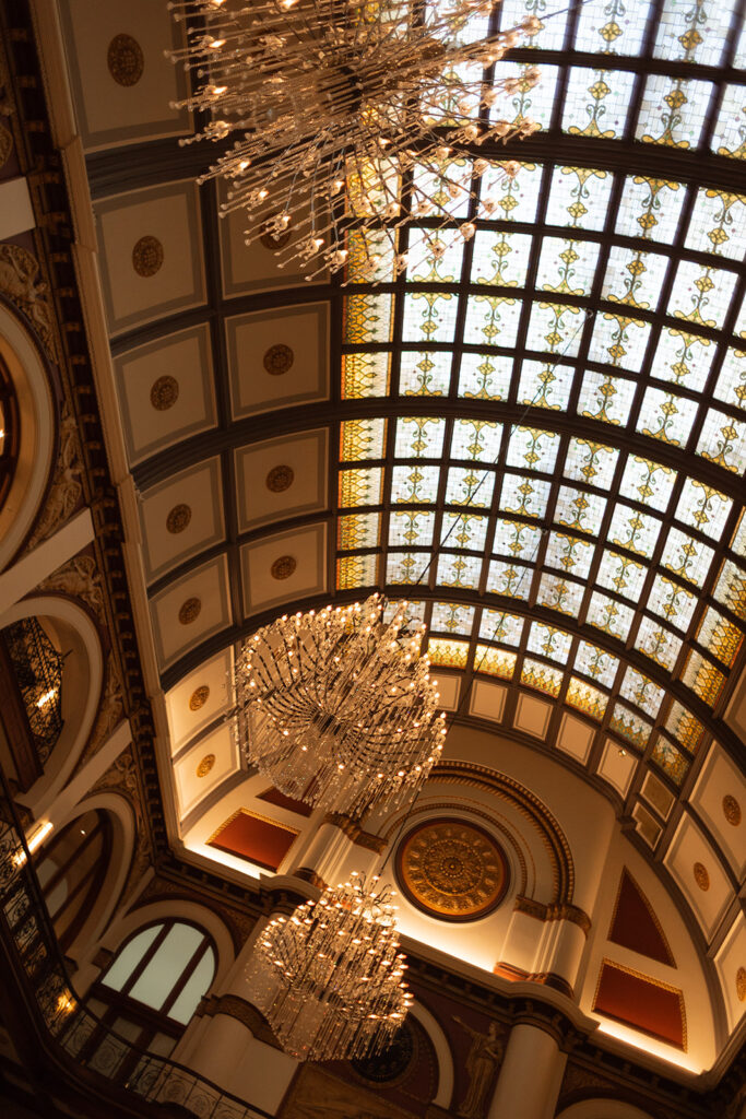 Sprawling view of ornate windows and chandeliers at Union Station in Nashville