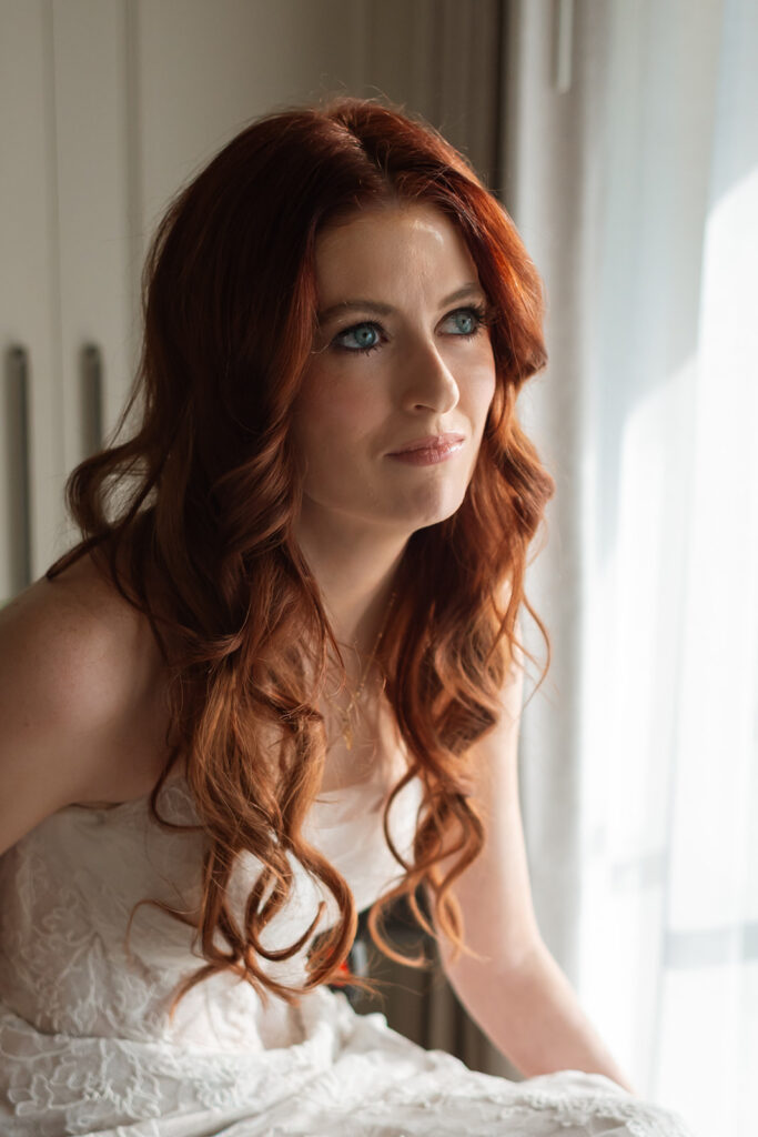 Portrait of Fiona Cauley on her wedding day at Union Station in Nashville, as captured by documentary wedding photographer Ali Miller.