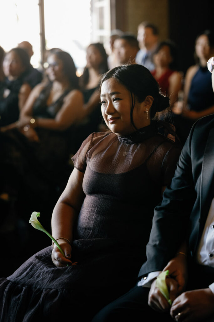 Photographing emotional reactions of wedding guests during a ceremony is one of the most meaningful wedding ideas out there